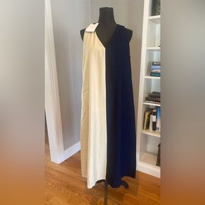 New with tags, Pomander Place two tone Black/Tan sleeveless dress. Size Medium